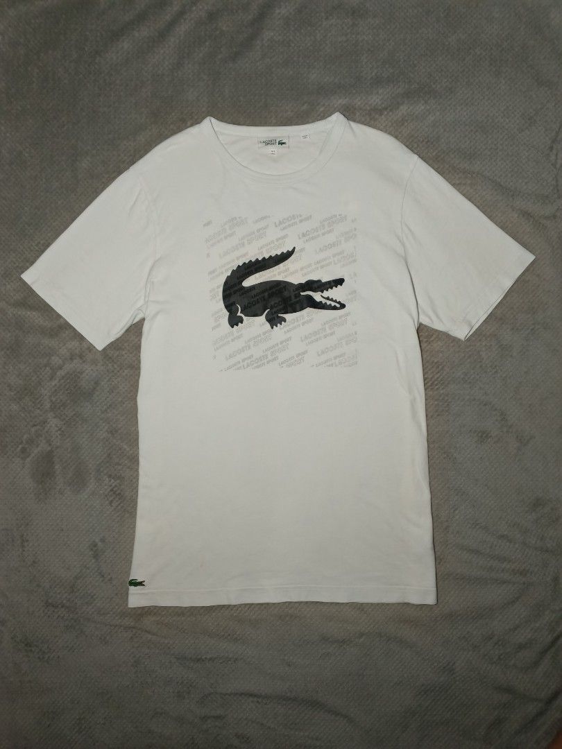 Lacoste T-shirt (Category: Tshirts & Polo Shirts ) located in Cebu City. Submitted by authenticgrids (Listing ID 1469887559, Image 1). Description: Lacoste T-shirt Lacoste Big 🐊 Logo Print Excellent/Like New Condition ✨ Issue/s: None 💯 Size on Tag 🏷️ FR 5 US L Dimensions Width 23 inches Length 30 inches 📥📥📥📥📥 DM us for more details ☺️.