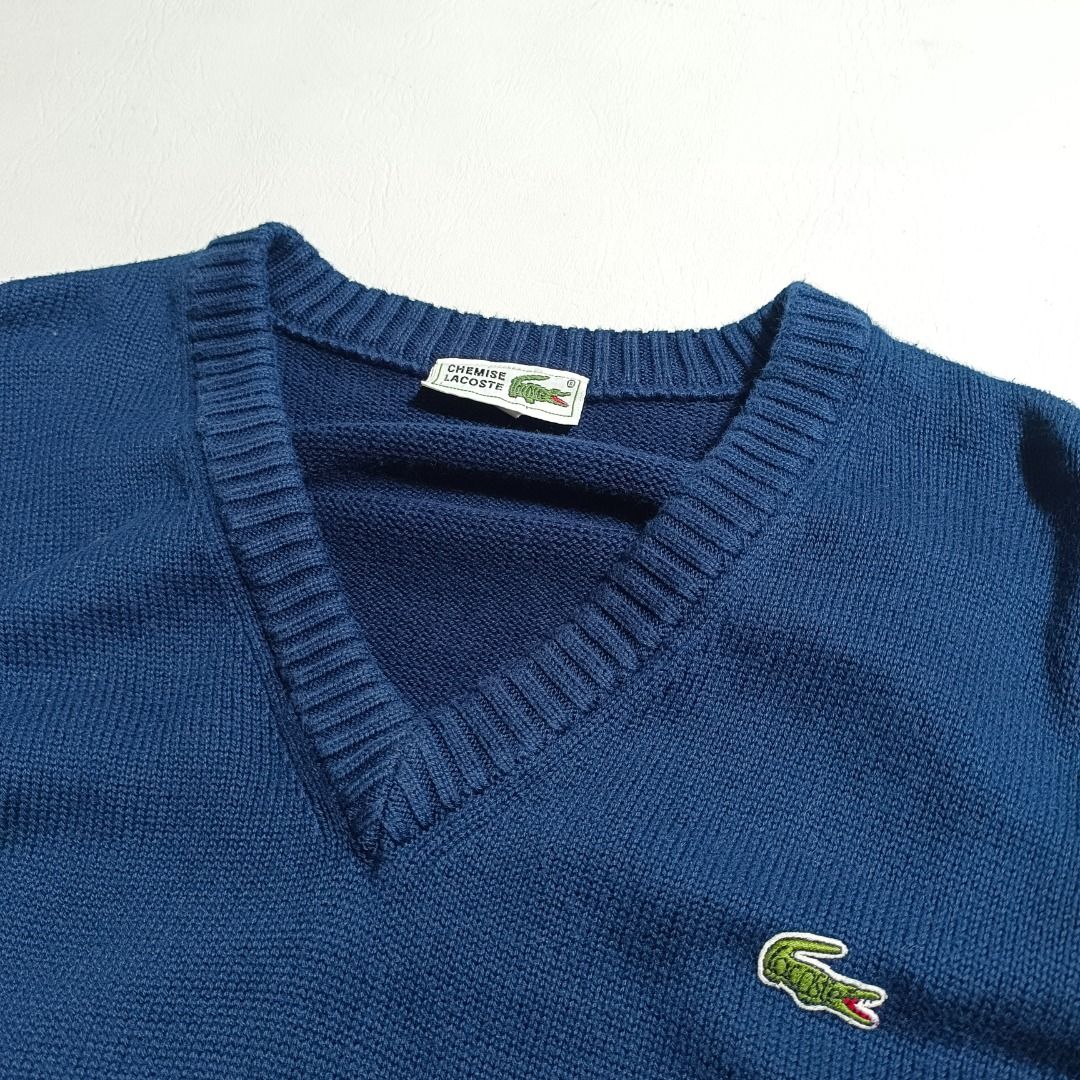 Lacoste Vneck Knitted Sweater🐊 (Category: Coats, Jackets and Outerwear) located in Baguio. Submitted by freshmarket_2600 (Listing ID 1469884282, Image 2). Description: Brand: Chemise Lacoste Vneck Knitted Sweater Tags: Complete Size: Size 4- M-L Dimension: L25W22 Condition: Excellent Color rate: 10/10 Color: Navy blue Issue/s: None.