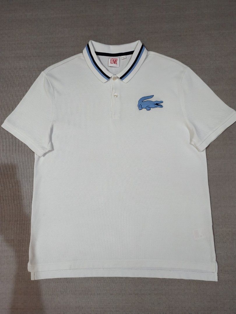 LACOSTE WHITE BIG LOGO (Category: Tshirts & Polo Shirts ) located in Baliuag. Submitted by vk_thrift01 (Listing ID 1469914337, Image 2). Description: LACOSTE BIG LOGO WHITE DIMES: 22 X 27.5 FRONT 28.5 BACK CONDI: EXCELLENT CONDITION COLOR RATE: 9.5/10 ISSUE: MINIMAL FOLD LINES AND SUPER LIGHT STAIN ON THE BACK STILL NEGO JUST MAKE AN OFFER NOTE: ‼️‼️‼️ 📌ALL ITEMS ARE THRIFTED NOT BRANDNEW SO KINDLY MANAGE YOUR EXPECTATIONS. 📌ALL ITEMS ARE NEEDS