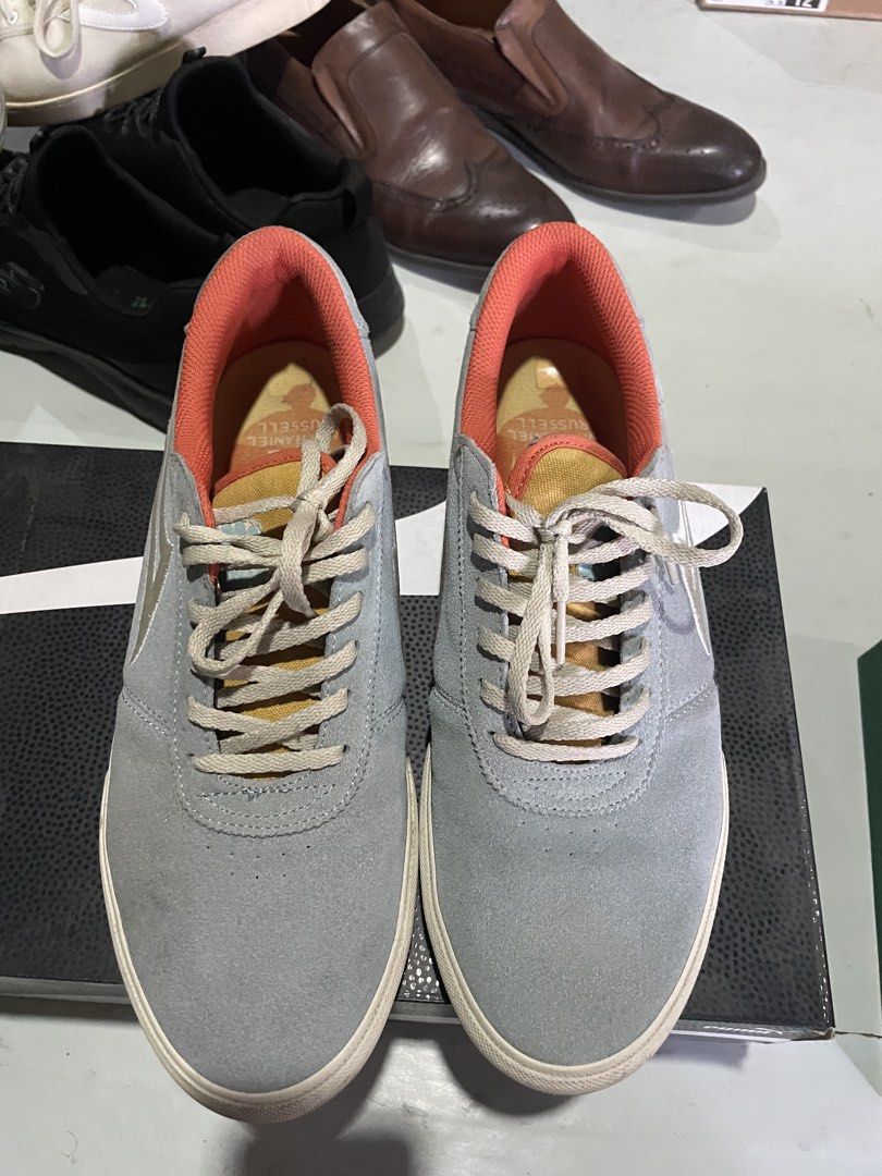 Lakai Grey x Nathaniel Russell (Category: Sneakers) located in Davao. Submitted by houkaygoods (Listing ID 1469890721, Image 1). Description: - Style: Classic low-top skate shoes - Color: Light grey suede with bright orange inner lining and beige laces - Accents: Stylish gold detailing near the collar - Soles: White rubber outsoles with standard grip tread (shows minor dirt marks from previous wear) - Condition: Pre-loved, well-maintained, and fu