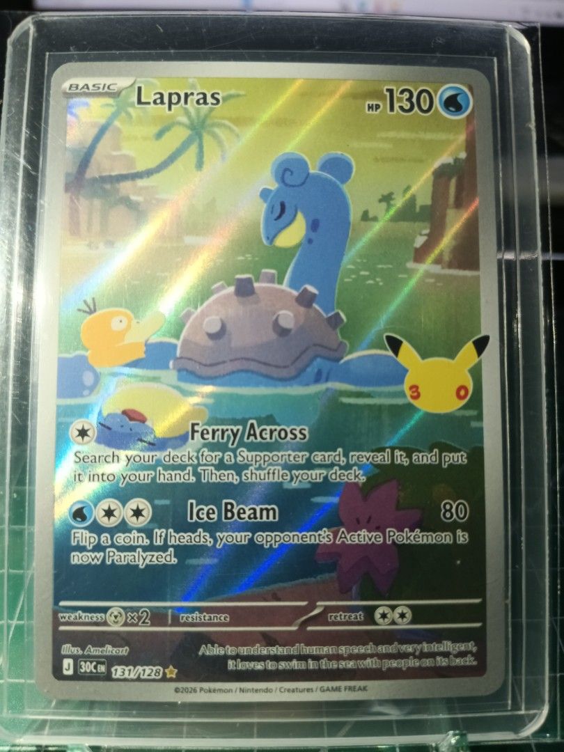 Lapras 131/128 IR (Category: Raw Singles) located in General Trias. Submitted by hobbyshare19 (Listing ID 1469915873, Image 1). Description: WTS (Want to Sell) • Character Name: Lapras (English Version) • Card Code: 131/128 IR • Rarity: Illustration Rare (IR) / 1 Gold Star • Set: ME: 30th Celebration Anniversary Expansion • Condition: Near Mint (Kept in OPP plastic + toploader + toploader sleeve) • Price: ₱450 • Location: General Trias, Cavite • 