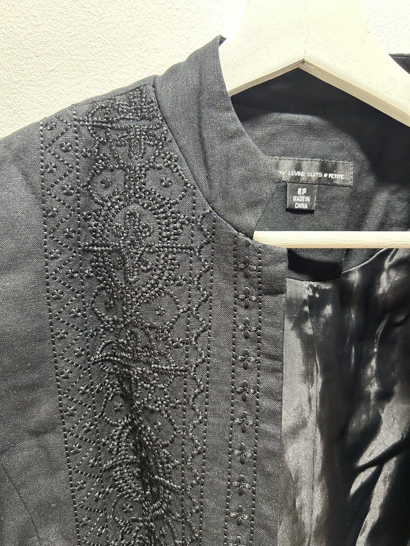 Larry Levine Suits Petite Black Embroidered Jacket Size 8P (Category: Coats, Jackets and Outerwear) located in Manila. Submitted by isabelle_1104 (Listing ID 1469917501, Image 1). Description: - Brand: Larry Levine Suits Petite - Size: 8P - Color: Black - Style: Open front jacket with mandarin collar - Detail: Heavy textured embroidery on front panel - Interior: Fully lined with smooth satin fabric - Origin: Made in China.