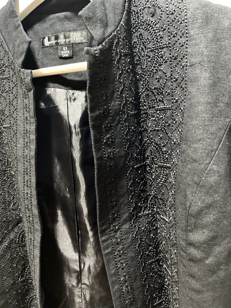 Larry Levine Suits Petite Black Embroidered Jacket Size 8P (Category: Coats, Jackets and Outerwear) located in Manila. Submitted by isabelle_1104 (Listing ID 1469917501, Image 3). Description: - Brand: Larry Levine Suits Petite - Size: 8P - Color: Black - Style: Open front jacket with mandarin collar - Detail: Heavy textured embroidery on front panel - Interior: Fully lined with smooth satin fabric - Origin: Made in China.