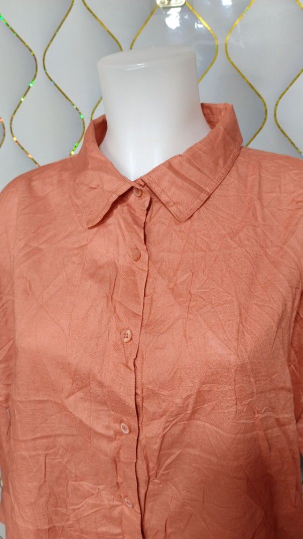 lativ Cotton Button-Up Shirt (Category: Shirts) located in Manila. Submitted by zariyah.1986 (Listing ID 1469811410, Image 3). Description: - Brand: Lativ - Color: Rust - Size: Small - Material: 100% Cotton - Design: Classic collar, front button closure, and long sleeves with button cuffs - Style: Casual basic top, easy to pair with jeans or trousers.