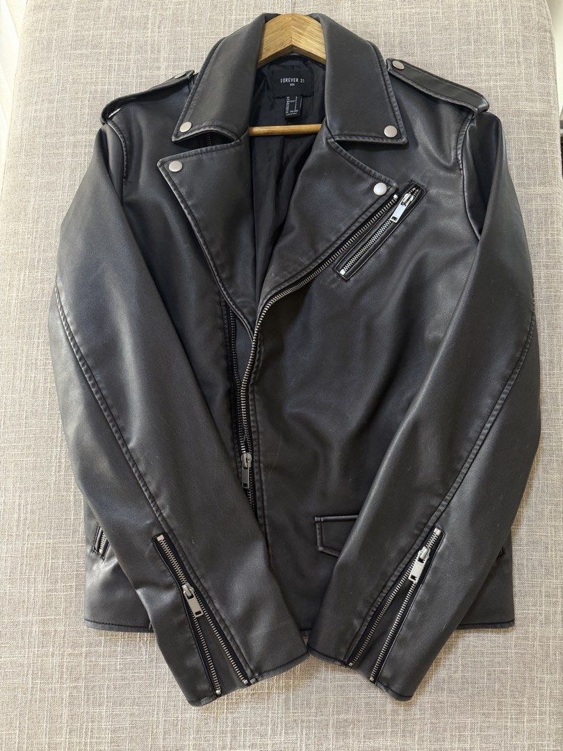 Leather Biker Acid Jacket (Category: Coats, Jackets and Outerwear) located in Makati City. Submitted by user85985149710 (Listing ID 1469768220, Image 3). Description: Acid wash design All zippers working Used once only Bust: 40” Length: 26” M-L .