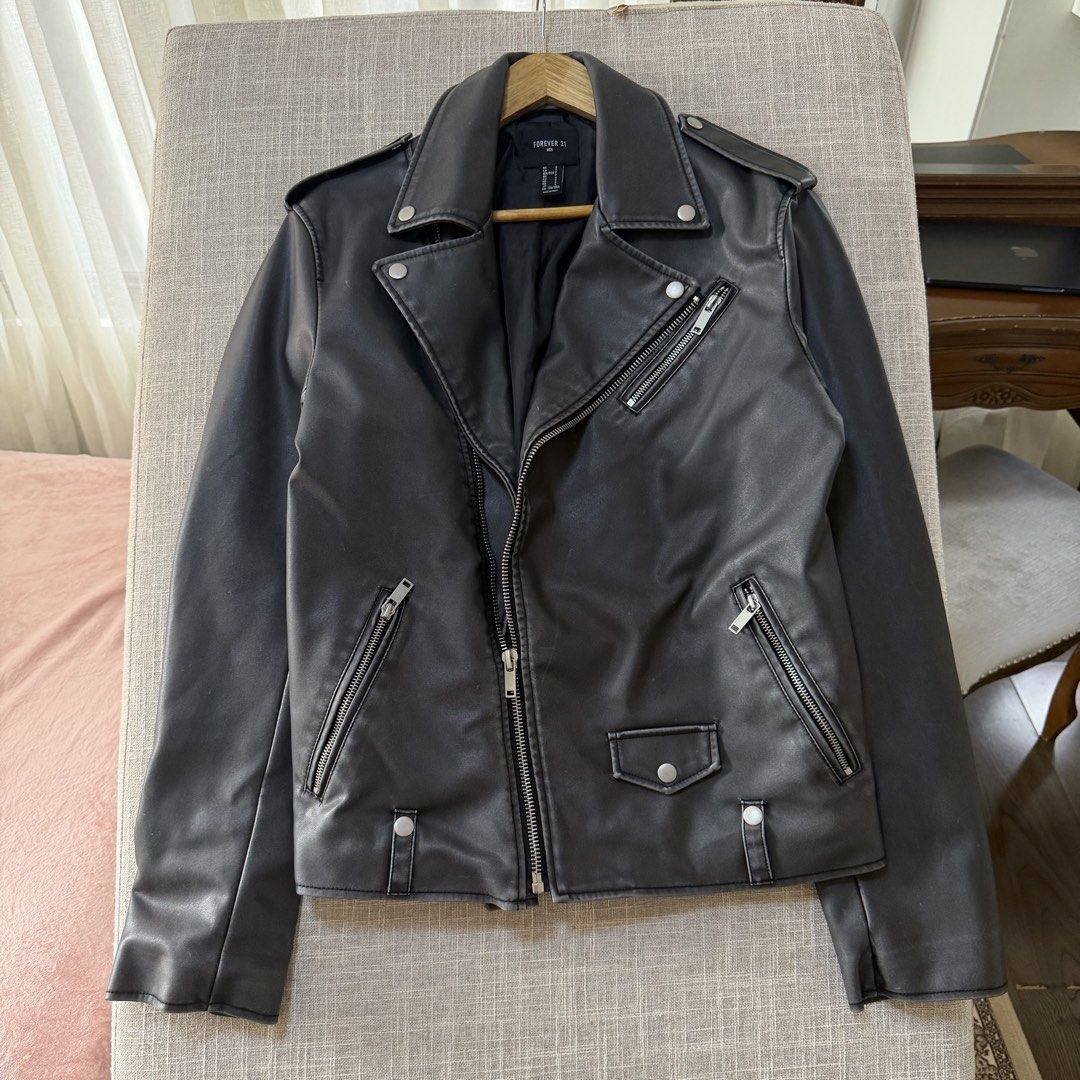 Leather Biker Acid Jacket (Category: Coats, Jackets and Outerwear) located in Makati City. Submitted by user85985149710 (Listing ID 1469768220, Image 1). Description: Acid wash design All zippers working Used once only Bust: 40” Length: 26” M-L .