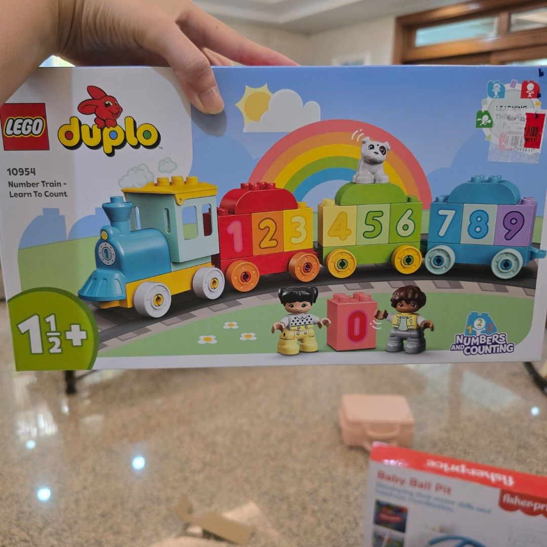 LEGO Duplo 10954 Number Train Learn To Count (Category: Lego & Building Sets) located in Manila. Submitted by cat.dee (Listing ID 1469786300, Image 1). Description: - LEGO Duplo 10954 Number Train toddler building toy - Perfect for learning numbers and counting (numbers 1 to 10) - Includes colorful number blocks, 2 child figures, and a cute dog figure - Designed for young kids starting from 1.5 years old - Original box included with store price s
