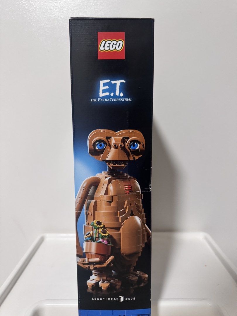 LEGO Ideas E.T. The Extra-Terrestrial #078 21370 (Category: Lego & Building Sets) located in Manila. Submitted by itissyours_ (Listing ID 1469874901, Image 3). Description: - Set: LEGO Ideas E.T. The Extra-Terrestrial (#078, Set Code: 21370) - Piece Count: 1226 pieces - Recommended Age: 18+ years - Key Features: Buildable alien figure, potted flowers, light brick for glowing chest, and iconic pointing finger with glowing red tip - Packaging: Box 