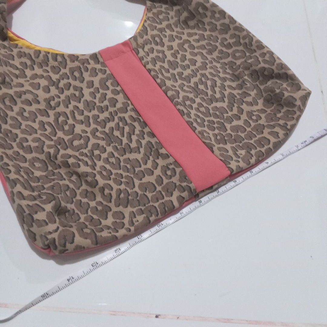 Leopard print pink boho bag (Category: Shoulder Bags) located in Dumaguete. Submitted by fancy.bunny (Listing ID 1469792229, Image 2). Description: Women's bag made from old pants I repurposed. 2 faced bag, plain pink and leopard print..