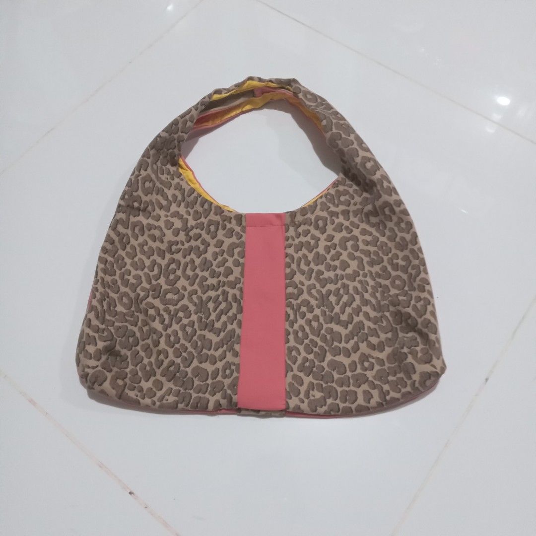 Leopard print pink boho bag (Category: Shoulder Bags) located in Dumaguete. Submitted by fancy.bunny (Listing ID 1469792229, Image 1). Description: Women's bag made from old pants I repurposed. 2 faced bag, plain pink and leopard print..