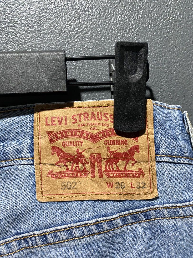 Levi's 502 Jeans W29 L32 Light Wash (Category: Jeans) located in Lucena. Submitted by handpickthrift (Listing ID 1469840372, Image 3). Description: - Brand/Model: Classic Levi's 502 Denim Jeans - Size: W29 L32 - Color/Wash: Light wash blue - Fit: Regular taper fit - Details: Five-pocket styling, contrast yellow stitching, button closure - Branding: Iconic red tab on the back pocket and leather waistband patch - Condition: Great everyday staple, r