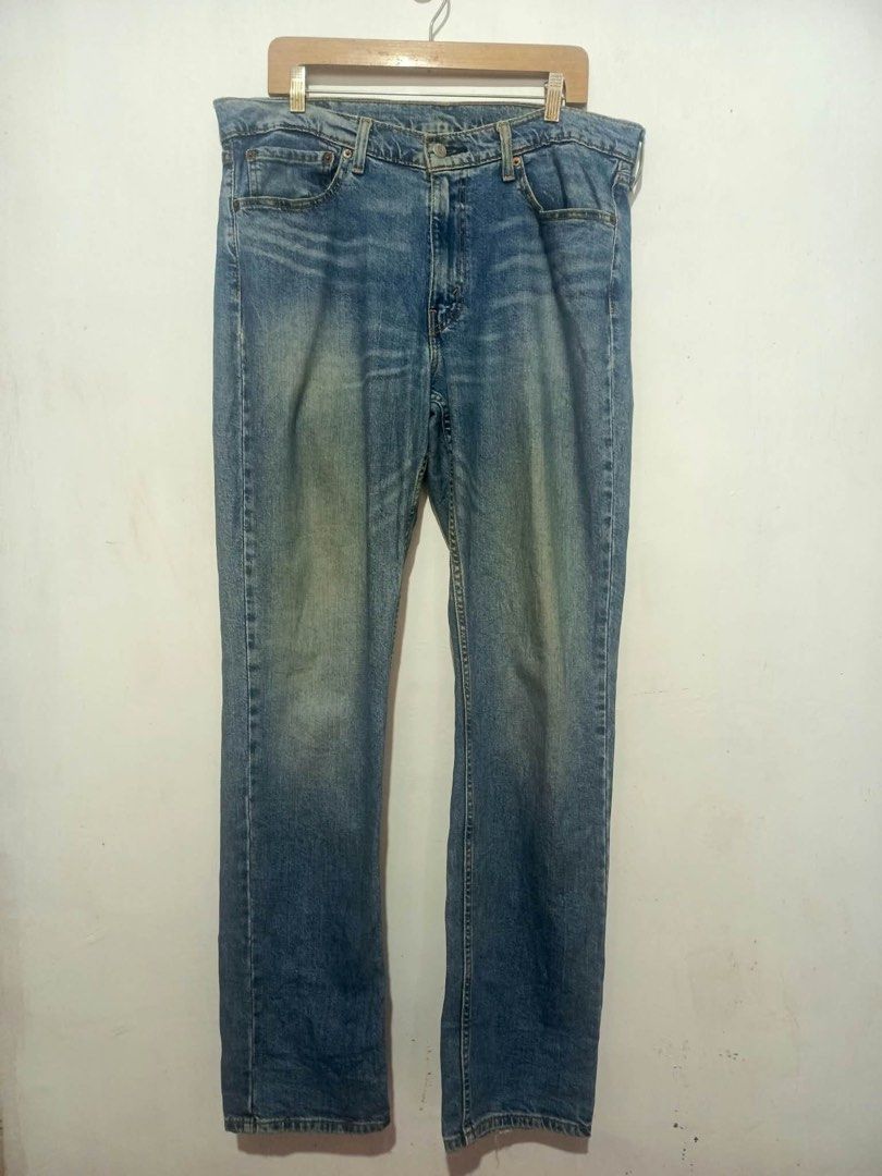 Levi's 511 Slim Fit Jeans W36 L34 (Category: Jeans) located in Baguio. Submitted by miisthyshop.ph (Listing ID 1469909577, Image 1). Description: - Brand: Levi's 511 Slim Fit Jeans - Size: W36 L34 - Color: Mid wash blue with faded details on thighs and knees - Closure: Classic button fly - Details: Five-pocket styling, leather back patch, and signature red tab - Material: Sturdy, comfortable denim ideal for everyday wear.