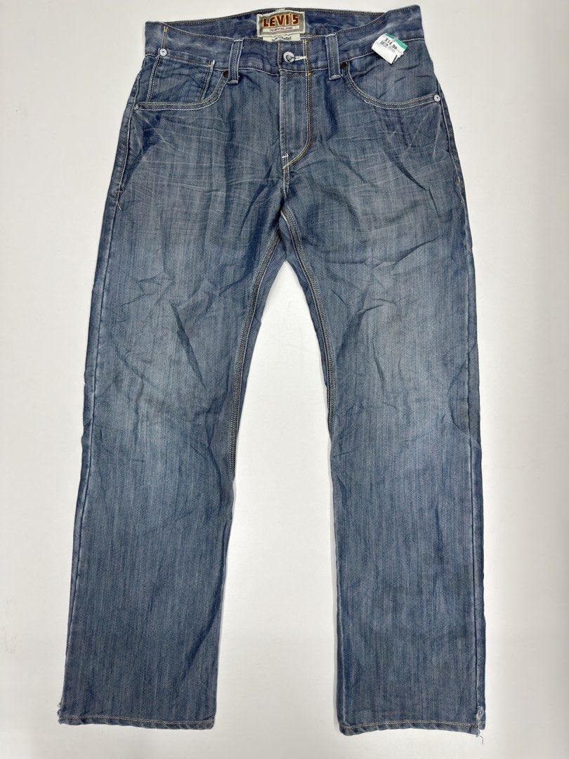 Levi's 514 Slim Straight Denim Jeans (Category: Jeans) located in Bustos. Submitted by thenlnclot60500 (Listing ID 1469874363, Image 1). Description: - Brand: Levi's 514 - Fit: Slim straight leg - Color: Classic mid-blue wash - Closure: Button fly with belt loops - Pockets: Standard front pockets and unique button-flap back pockets - Details: Signature leather patch on the back waistband - Condition: Great everyday wear.