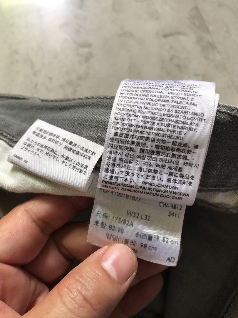 Levi's Grey Jeans W32 L32 (Category: Jeans) located in Banga. Submitted by brighthorse.b8f582 (Listing ID 1469764661, Image 3). Description: - Brand: Levi's - Color: Grey - Size: W32 L32 - Fit: Standard straight leg - Material: 100% Cotton - Closure: Button fly with branded zipper - Details: Classic 5-pocket design, leather back patch, and signature red tab - Condition: Clean wash with inner tags intact - DM for exact measurements and inquiries!.