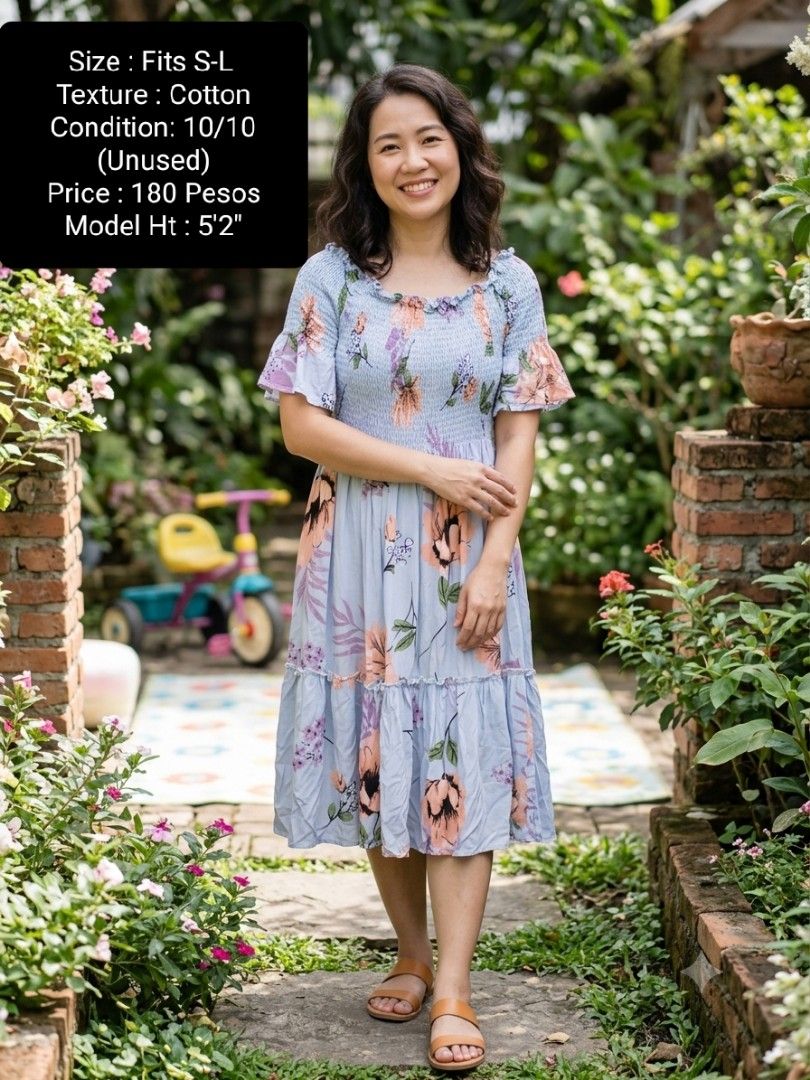 Light Blue Floral Midi Dress (Category: Dresses) located in Santa Maria. Submitted by anne_s.list (Listing ID 1469871623, Image 1). Description: - Condition: Brand new / Unused - Material: Textured cotton - Color/Pattern: Light blue with peach floral print - Fit: Smocked bodice comfortably fits small to large frames - Design details: Ruffle sleeves and tiered skirt - Style: Perfect for casual wear, dates, or weekend errands.