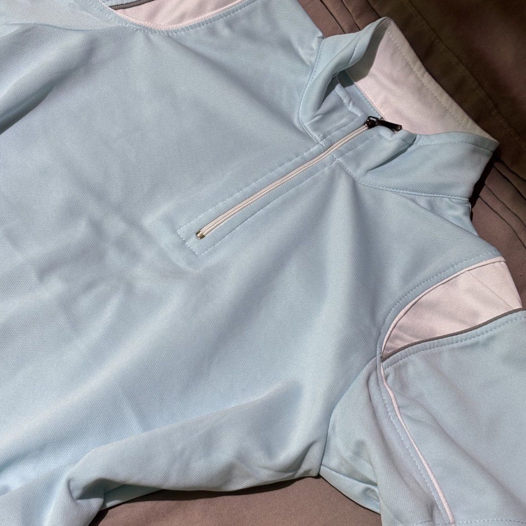 Light blue half-zip athletic polo shirt size M (Category: Activewear) located in Manila. Submitted by shimiiiiiii (Listing ID 1469801346, Image 2). Description: personal preloved worn once best fit s-m .