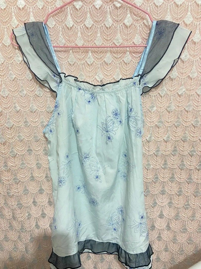 LIGHT BLUE RUFFLE UNIQUE DESIGN TOP (Category: Blouses) located in Masbate. Submitted by gurly_trifth26 (Listing ID 1469841297, Image 1). Description: GOOD AS NEW🌺 SIZE: SMALL🌺 PRICE:89 LOCK 99🌺 MOP: GCASH🌺 MOD:J&T🌺.