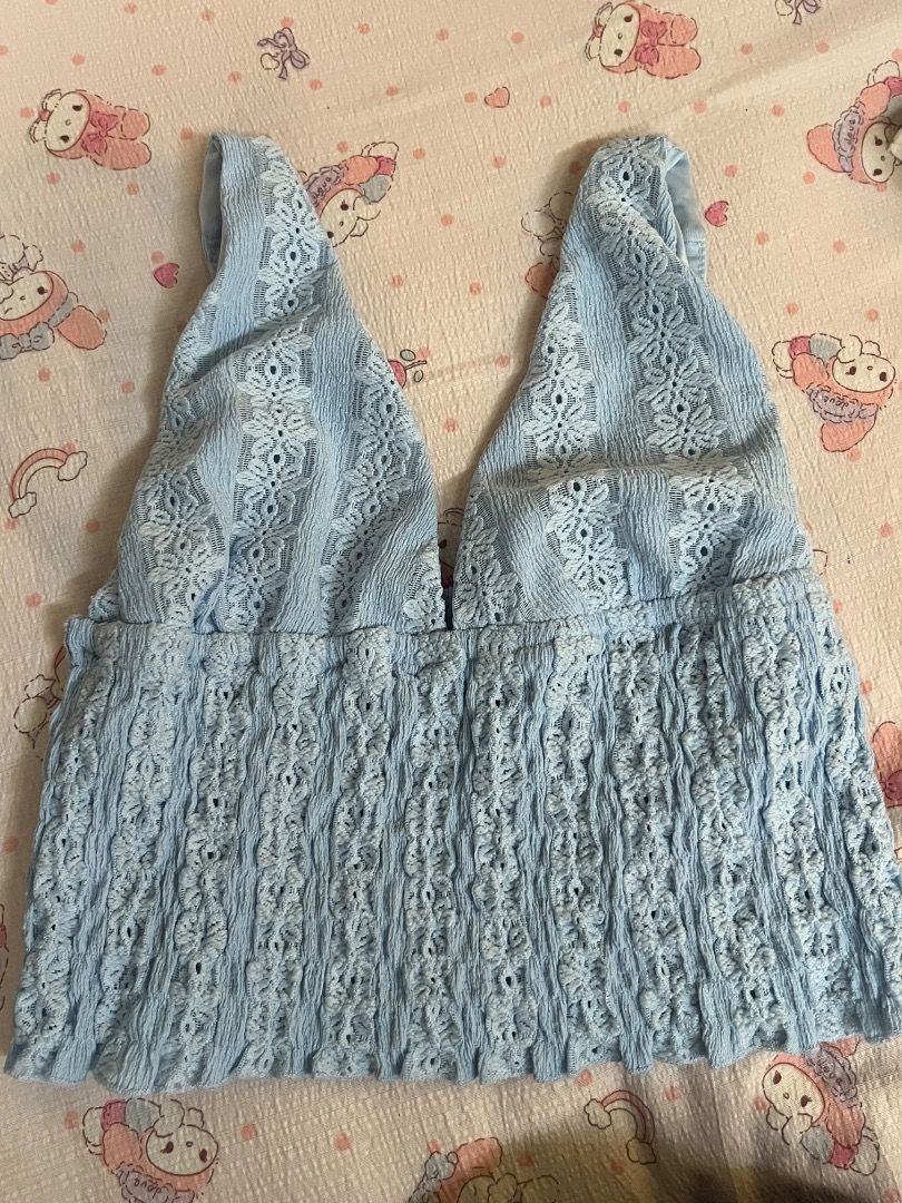 Light Blue Smocked Cropped Tank Top (Category: Sleeveless) located in Caloocan City. Submitted by zaviscool (Listing ID 1469873523, Image 1). Description: - Color: Light blue - Fit: Cropped length at the waist, super stretchy and comfy - Details: Heavy all-over smocking, V-neckline, textured vertical front stripes - Styling: Great for casual summer days or nights out with high-waisted jeans.