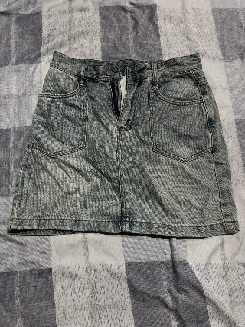 Light wash denim mini skirt with front pockets (Category: Skirts) located in Legazpi City. Submitted by chynnunez (Listing ID 1469876451, Image 1). Description: - Style: Casual everyday denim mini skirt - Color/Wash: Light wash - Closure: Front button and zipper fly - Pockets: Two large front patch pockets - Hem: Classic straight cut - Pairing: Perfect with basic tees and cozy sweaters.