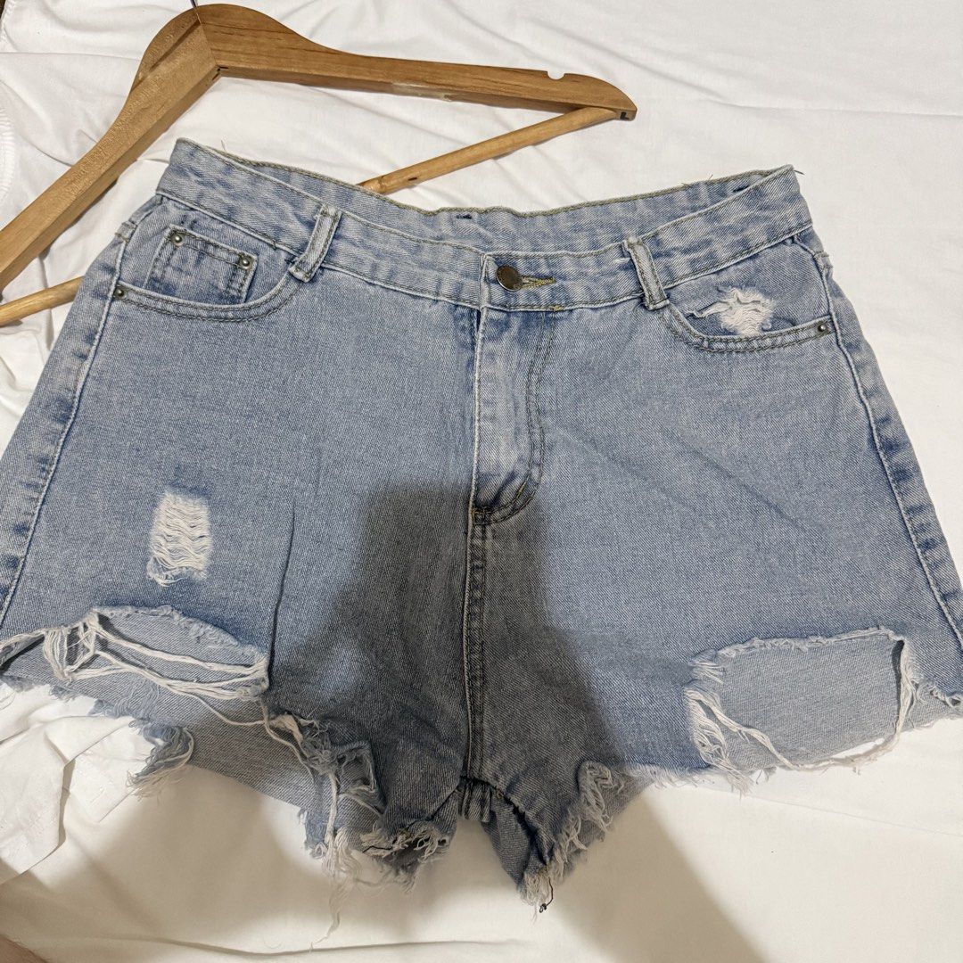 Light wash distressed denim shorts (Category: Shorts) located in Paranaque City. Submitted by llapbbb_ (Listing ID 1469854271, Image 2). Description: Pre-loved denim shorts Size: 30-31 .