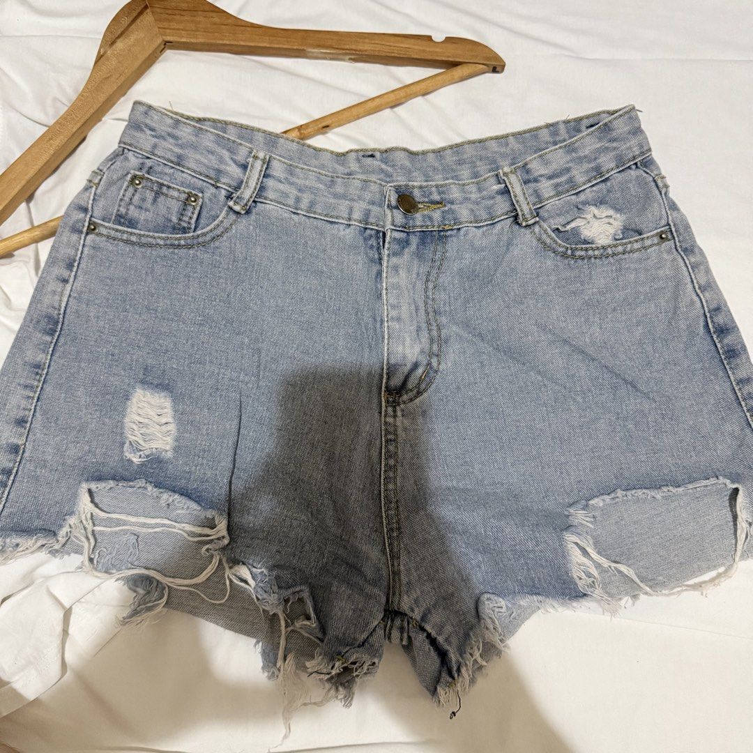 Light wash distressed denim shorts (Category: Shorts) located in Paranaque City. Submitted by llapbbb_ (Listing ID 1469854271, Image 1). Description: Pre-loved denim shorts Size: 30-31 .
