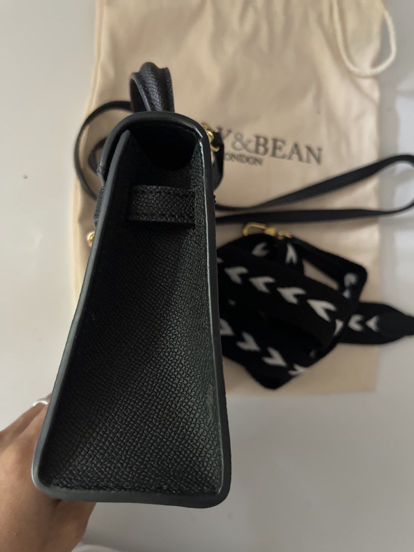 Lily and Bean Mini Kelly Bag inspired (Category: Cross-body Bags) located in Sorsogon. Submitted by comfortbeforestyle (Listing ID 1469814579, Image 3). Description: Pre-loved Lily and Bean Hettie Bag in Black Letting go of this super elegant top-handle bag. It looks very close to a Mini Kelly bag and easily matches any outfit color or style. It is still available on the website now. Personally bought it for ₱17,500. Decluttering because I have t