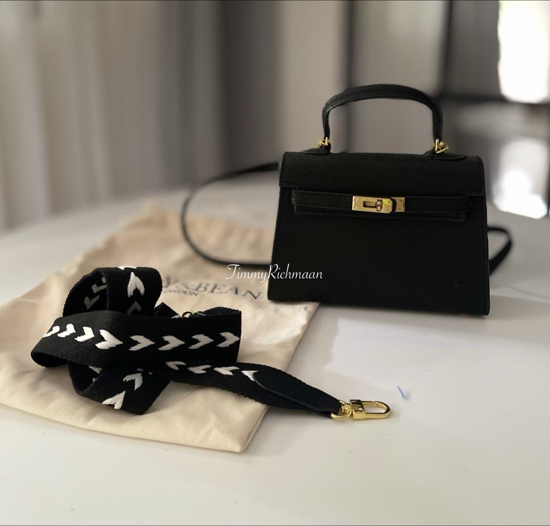 Lily and Bean Mini Kelly Bag inspired (Category: Cross-body Bags) located in Sorsogon. Submitted by comfortbeforestyle (Listing ID 1469814579, Image 2). Description: Pre-loved Lily and Bean Hettie Bag in Black Letting go of this super elegant top-handle bag. It looks very close to a Mini Kelly bag and easily matches any outfit color or style. It is still available on the website now. Personally bought it for ₱17,500. Decluttering because I have t
