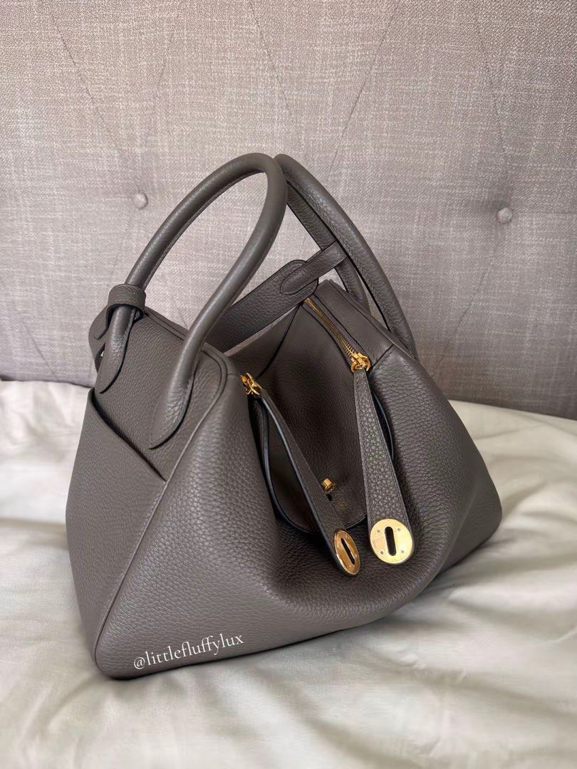 LINDY 30 GRIS ETAIN (Category: Luxury Bags & Wallets) located in Pasig City. Submitted by littlefluffylux (Listing ID 1469892180, Image 1). Description: - Hermes Lindy 30 - Color: Gris Etain - Gold Hardware - Condition : Pre-loved / please see photos for actual condition ‼️ Not Guaranteed RFS: Decluttering some of my Lindy Collection 📸Actual item and hotos posted. For Serious buyers only. Please inspect all photos carefully before purchasing. .