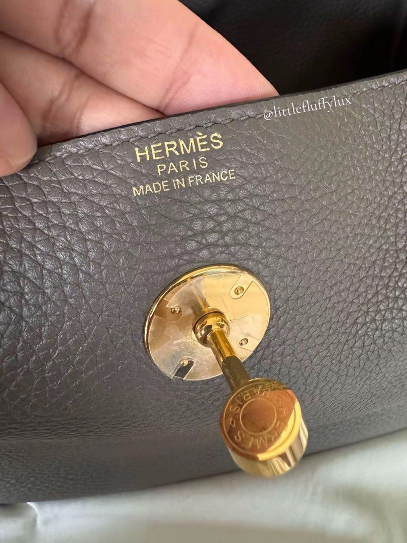 LINDY 30 GRIS ETAIN (Category: Luxury Bags & Wallets) located in Pasig City. Submitted by littlefluffylux (Listing ID 1469892180, Image 3). Description: - Hermes Lindy 30 - Color: Gris Etain - Gold Hardware - Condition : Pre-loved / please see photos for actual condition ‼️ Not Guaranteed RFS: Decluttering some of my Lindy Collection 📸Actual item and hotos posted. For Serious buyers only. Please inspect all photos carefully before purchasing. .