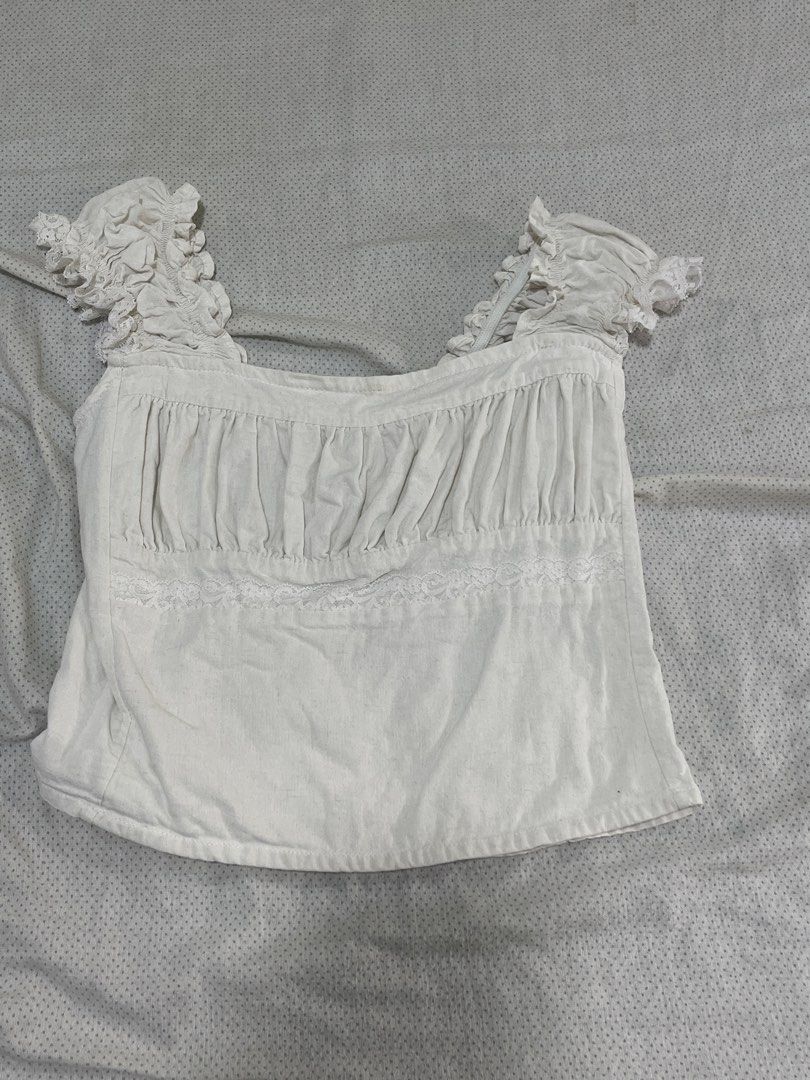 Linen Milkmaid Top (Category: Blouses) located in Paranaque City. Submitted by lovenclutter (Listing ID 1469808396, Image 1). Description: Has yellow stain (can be bleached) .