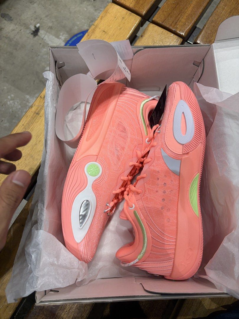 Li-Ning All City 14 Encore (Category: Sneakers) located in Manila. Submitted by newstar.4d3ba0 (Listing ID 1469781624, Image 1). Description: - Brand: Li-Ning Basketball Kicks - Condition: 9.5/10 used once during wade’s event - Colorway: Striking peach pink/coral with neon green and white accents - Authenticity: Purchased from Toby's Sports Flagship BGC (original receipt included) - Key Feature: Visible carbon fiber plate on the lateral side - In