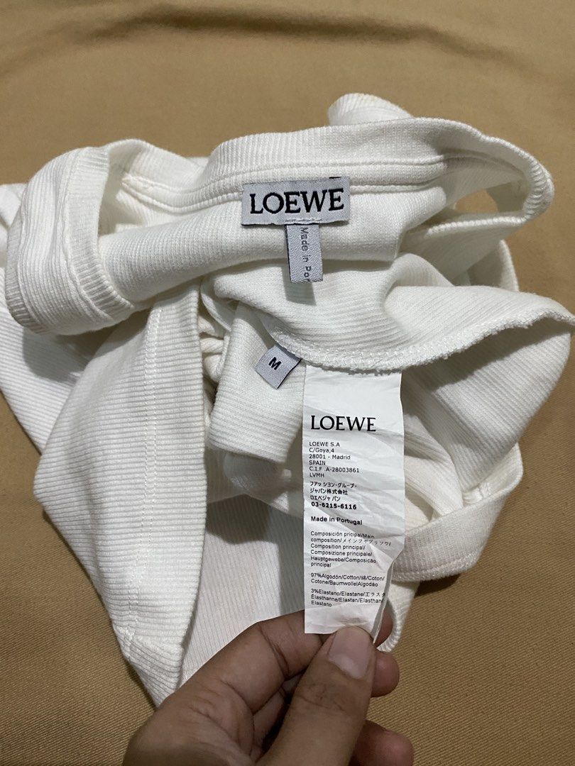 Loewe Anagram Top (Category: Luxury Apparel) located in Samal. Submitted by regbos26 (Listing ID 1469886934, Image 3). Description: Lo€w€ Anagram Tank Top Super bet!😍 Gwapa kaayo ni Ribbed Like new Lakas maka body shape🥰 Embroid details Stretch XS-M Complete tags.