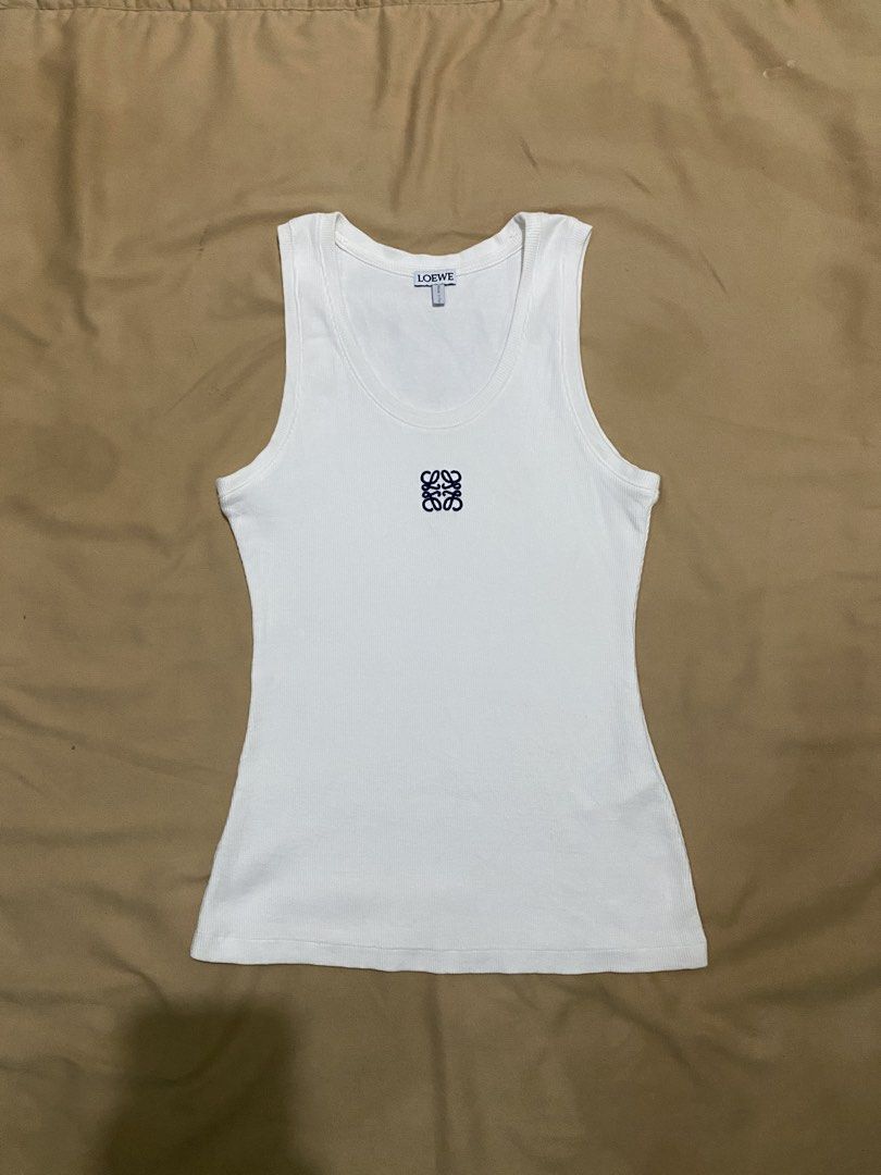 Loewe Anagram Top (Category: Luxury Apparel) located in Samal. Submitted by regbos26 (Listing ID 1469886934, Image 1). Description: Lo€w€ Anagram Tank Top Super bet!😍 Gwapa kaayo ni Ribbed Like new Lakas maka body shape🥰 Embroid details Stretch XS-M Complete tags.