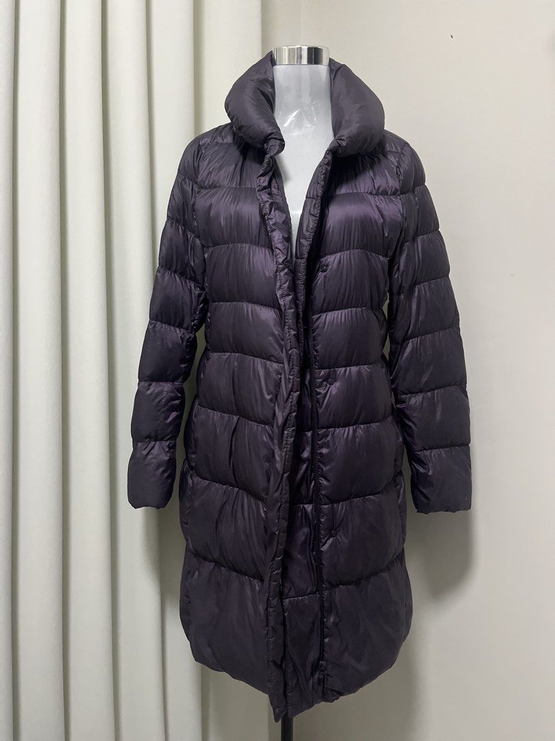 Long Puffer Down Coat Dark Purple Winter Jacket (Category: Coats, Jackets and Outerwear) located in Angeles City. Submitted by pinkpool (Listing ID 1469765379, Image 1). Description: - Color: Dark purple / Eggplant shade - Length: Knee-length - Warmth: Keeps you super cozy during cold days - Collar: High collar design to block the wind - Closure: Front zipper with secure button snaps - Style: Horizontal quilted pattern with long sleeves.