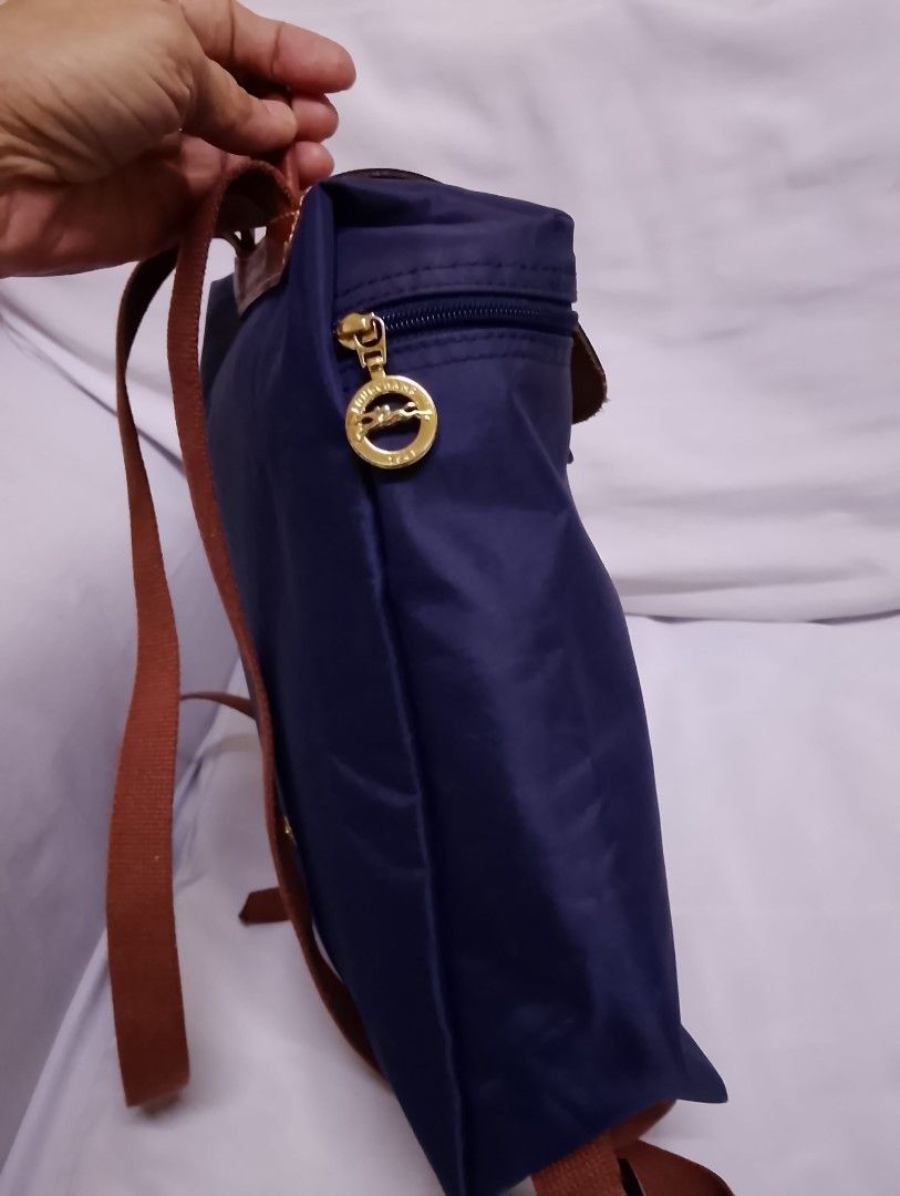 Longchamp backpack (Category: Backpacks) located in Quezon City. Submitted by isabelle_1212_ (Listing ID 1469851099, Image 3). Description: no flaws, not faded authentic.