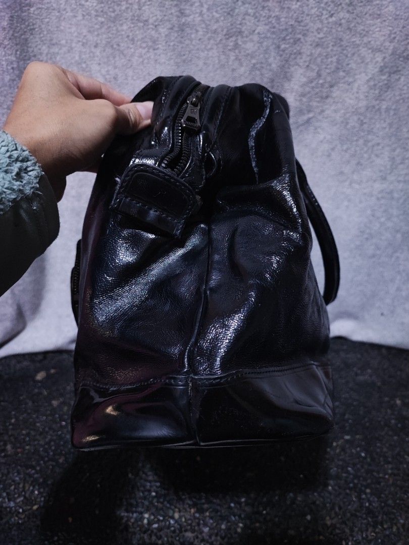Longchamp Black Patent Leather Handbag (Category: Luxury Bags & Wallets) located in Baguio. Submitted by ozara.06 (Listing ID 1469832555, Image 3). Description: Longchamp patent leather Large 15" X 6.5" x 10 In very good condition pa 2500.