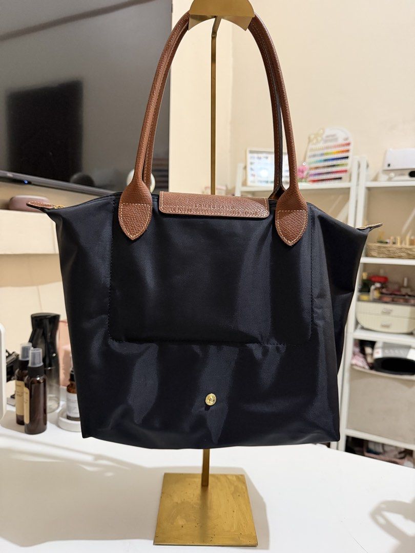 Longchamp Le Pliage in Medium Black (Category: Tote Bags) located in Manila. Submitted by pinkkitkat (Listing ID 1469929528, Image 2). Description: Kate Spade 454 Large Bag in Hot Fudge 🤎 * Well taken care of 😊 * 9.5/10 condition * Located in Tondo, Manila 📍 * Lalamove/Grab ready 🚗 PM for inquiries! 💌.