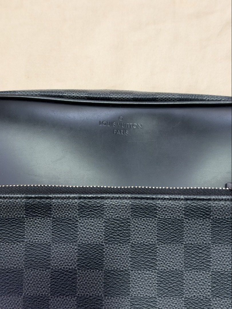 Louis Vuitton Damier Graphite Messenger Bag (Category: Luxury Bags & Wallets) located in Marikina City. Submitted by rctoby00 (Listing ID 1469935570, Image 3). Description: - Authentic Louis Vuitton Messenger Bag - Material: Damier Graphite canvas with black leather trim - Hardware: Silver-tone with dual zip closure - Strap: Adjustable black shoulder strap - Details: Louis Vuitton Paris hot stamp on front leather panel - Inclusion: Dust bag inclu