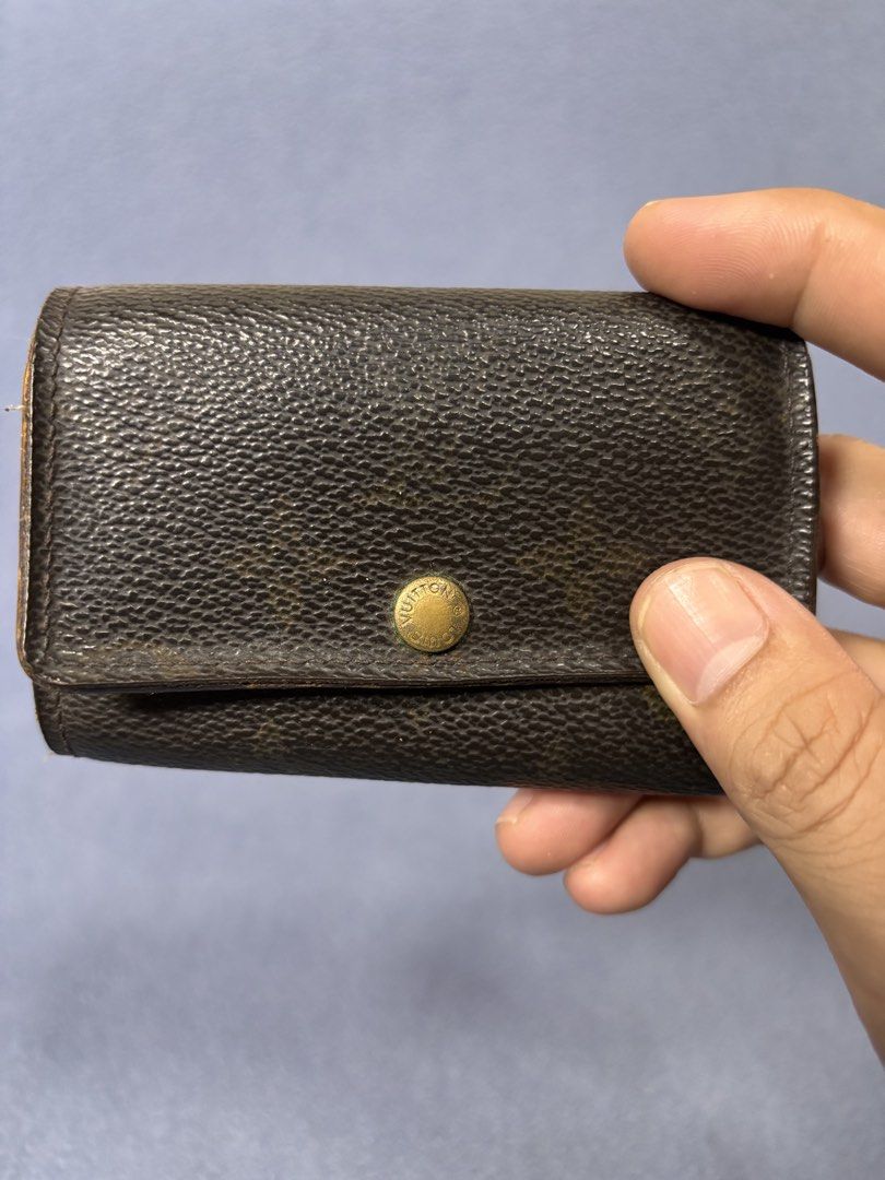 Louis Vuitton Monogram Canvas 4 Key Holder (Category: Luxury Bags & Wallets) located in Mabalacat. Submitted by _limitlessfashion (Listing ID 1469780567, Image 3). Description: - Authentic Louis Vuitton key holder - Classic monogram canvas with brown grained leather interior - Gold-tone Louis Vuitton Paris made in France hardware stamp - Secure front flap with snap button closure - Compact size, fits easily in pockets or bags - Condition: Normal 