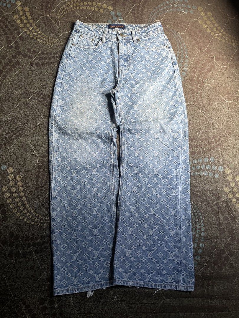 Louis Vuitton Monogram Denim Jeans Light Wash (Category: Jeans) located in Manila. Submitted by chawmichael (Listing ID 1469773970, Image 1). Description: - Authentic Louis Vuitton monogram denim jeans in light wash blue - Features all-over classic LV and quatrefoil motifs - Straight wide leg fit with a stylish raw distressed hem - Traditional button fly, belt loops, and five-pocket design - Detailed with LV branded interior waistband label and r