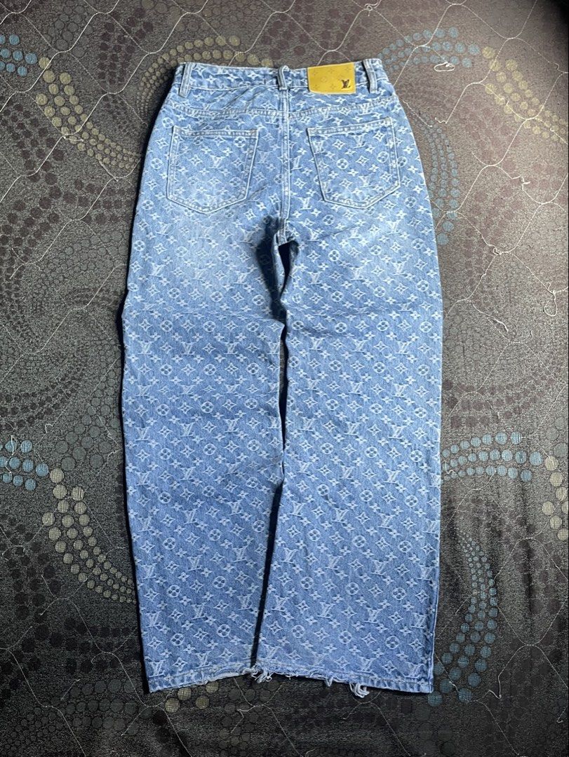 Louis Vuitton Monogram Denim Jeans Light Wash (Category: Jeans) located in Manila. Submitted by chawmichael (Listing ID 1469773970, Image 3). Description: - Authentic Louis Vuitton monogram denim jeans in light wash blue - Features all-over classic LV and quatrefoil motifs - Straight wide leg fit with a stylish raw distressed hem - Traditional button fly, belt loops, and five-pocket design - Detailed with LV branded interior waistband label and r