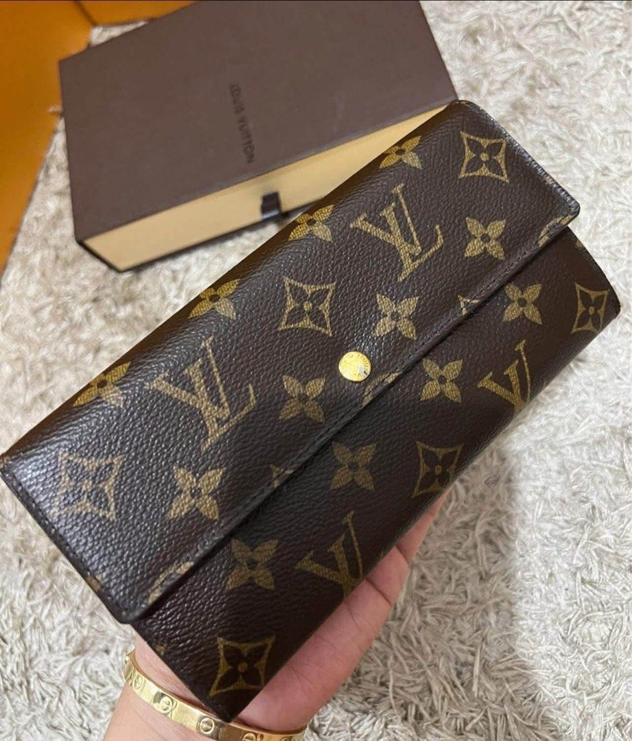 Louis Vuitton Monogram Sarah Wallet (Category: Luxury Bags & Wallets) located in Pasig City. Submitted by sheyfabph (Listing ID 1469816935, Image 2). Description: Louis Vuitton Sarah Wallet Excellent With dustbag and box 13,500.