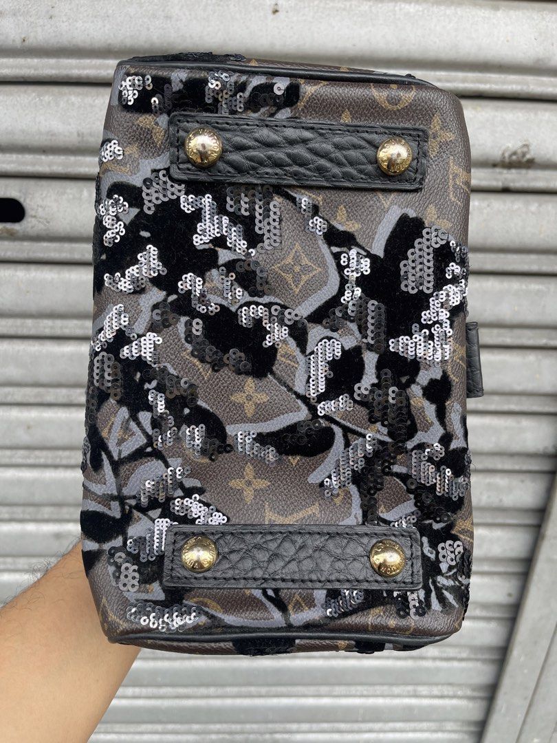 Louis Vuitton Monogram Sequin Flap Handbag (Category: Luxury Bags & Wallets) located in Quezon City. Submitted by karma_para_sa_bogus (Listing ID 1469817140, Image 3). Description: Louis Vuitton handbag combining monogram canvas, textured black leather flap, and dark sequin floral embroidery. Gold-tone front lock closure, leather top handle, and four bottom studs. Brown fabric lining inside with date code stamp TJ2150 and heritage label pocket. S