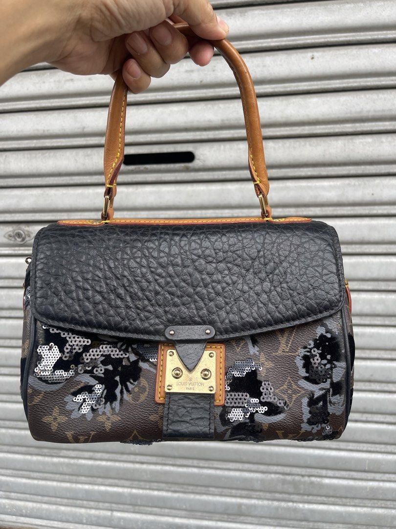 Louis Vuitton Monogram Sequin Flap Handbag (Category: Luxury Bags & Wallets) located in Quezon City. Submitted by karma_para_sa_bogus (Listing ID 1469817140, Image 1). Description: Louis Vuitton handbag combining monogram canvas, textured black leather flap, and dark sequin floral embroidery. Gold-tone front lock closure, leather top handle, and four bottom studs. Brown fabric lining inside with date code stamp TJ2150 and heritage label pocket. S
