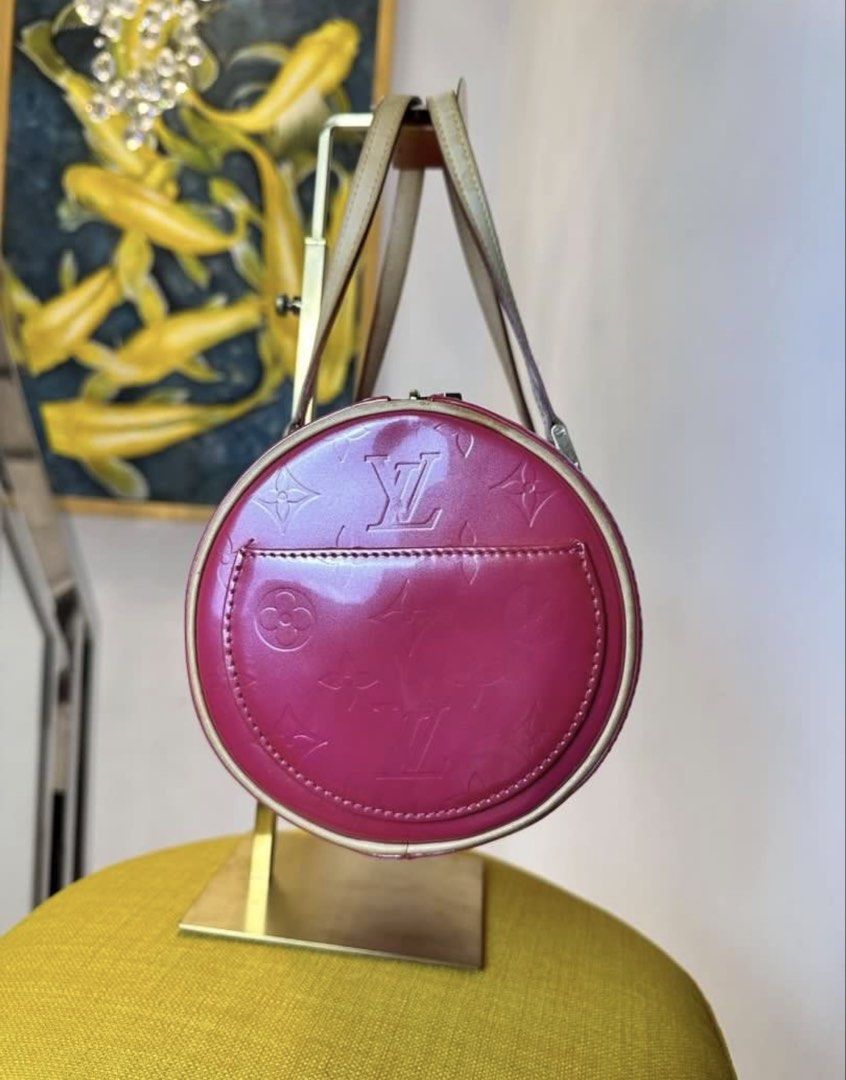 Louis Vuitton Monogram Vernis Papillon Handbag (Category: Luxury Bags & Wallets) located in Makati City. Submitted by bcloset2 (Listing ID 1469903776, Image 2). Description: - Brand: Louis Vuitton - Model: Papillon - Material: Pink Monogram Vernis Leather with Vachetta Trim - Shape: Cylindrical with structured handles - Closure: Top zip closure - Interior: Spacious pink lining with exterior side pocket - Inclusions: Original beige Louis Vuitton d
