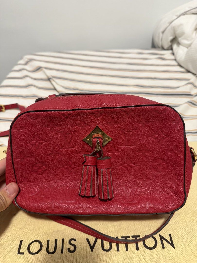 Louis Vuitton Saintonge Monogram Empreinte in Cherry Red (Category: Luxury Bags & Wallets) located in Iloilo. Submitted by lorenzoivan (Listing ID 1469761433, Image 2). Description: PRELOVED: Louis Vuitton Saintonge Monogram Empreinte in Cherry Red - ₱62,000 SRP: $1980 / ₱125,750 LEGIT/AUTHENTIC: w/ dustbag in good condition Flaws: little weak structure softened straps Asking for ₱62,000 (NEGOTIABLE) Pre-owned prices range from ₱58k-₱75k DM for m