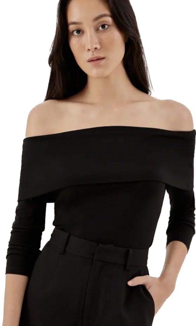 Love Bonito Black Off-Shoulder Top Size S (Category: Blouses) located in Pateros City. Submitted by overandout. (Listing ID 1469814443, Image 1). Description: - Brand: Love Bonito - Style: Black off-shoulder top with long sleeves and a folded collar overlay - Size: UK 8 / US 4 (Small) - Versatility: Easy to match with both trousers and skirts .