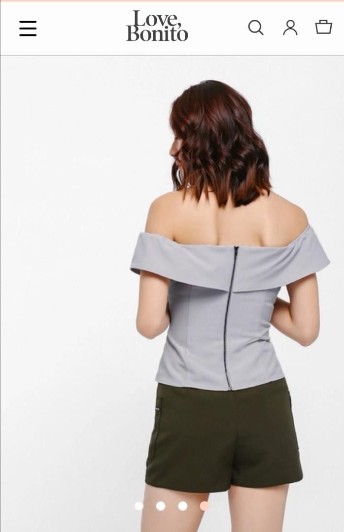 Love Bonito Off-Shoulder Ruffle Top (Category: Sleeveless) located in Calamba. Submitted by cheriiv (Listing ID 1469911237, Image 2). Description: - Brand/Model: Love Bonito off-shoulder top - Color: Light grey - Size: M (Fits UK 10 / US 6) - Design: Front flap overlays, structured pleats, exposed back zipper - Material: Smooth, slightly weighted fabric for a premium structure.