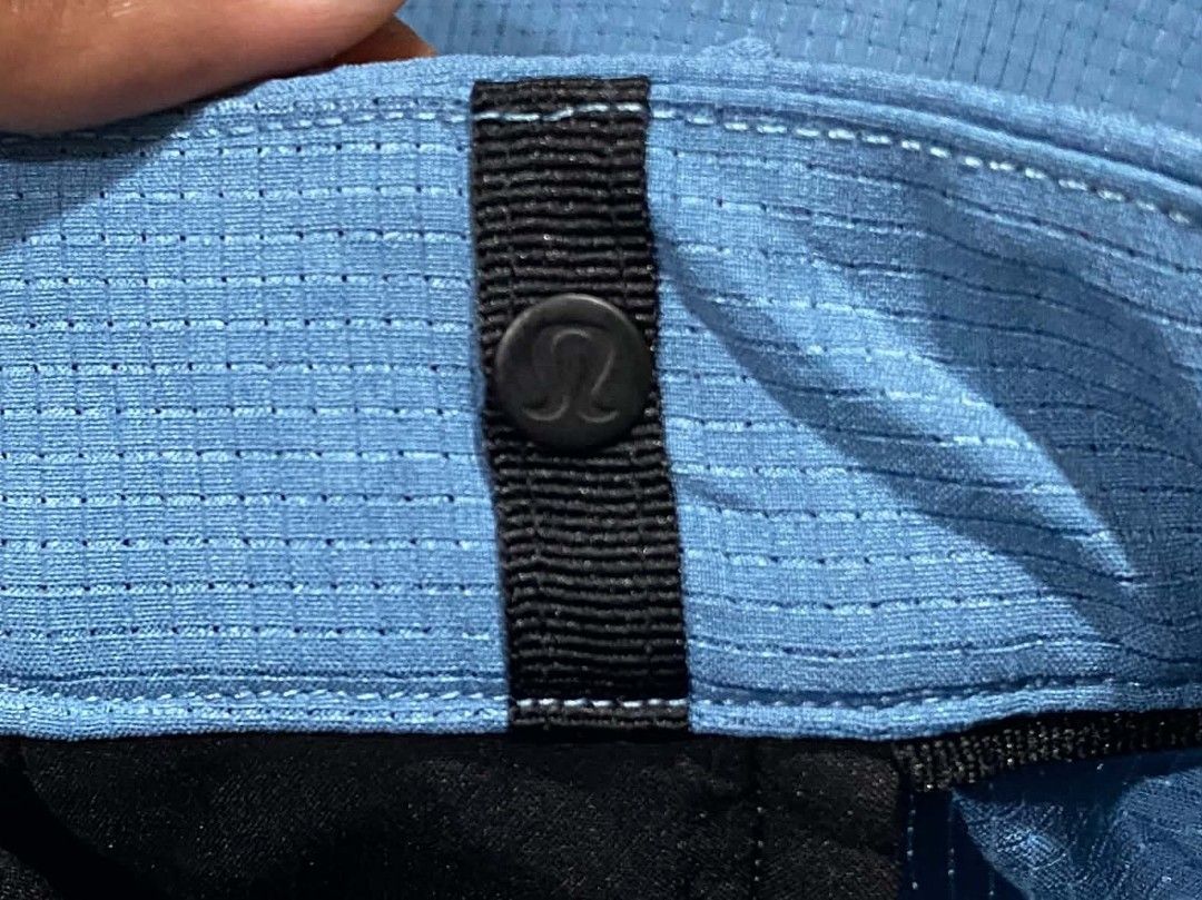 Lululemon ABC Shorts Textured Blue Size 34 (Category: Shorts) located in Sorsogon. Submitted by johnmichae69459 (Listing ID 1469811521, Image 3). Description: - Brand: Lululemon ABC Shorts - Color: Blue with stylish textured grid pattern - Size: 34 (verified on interior size dot) - 18 lenght - Storage: Standard pockets plus an extra secure zippered side pocket - Details: Button waist closure with belt loops - Condition: Impeccable, clean inside a