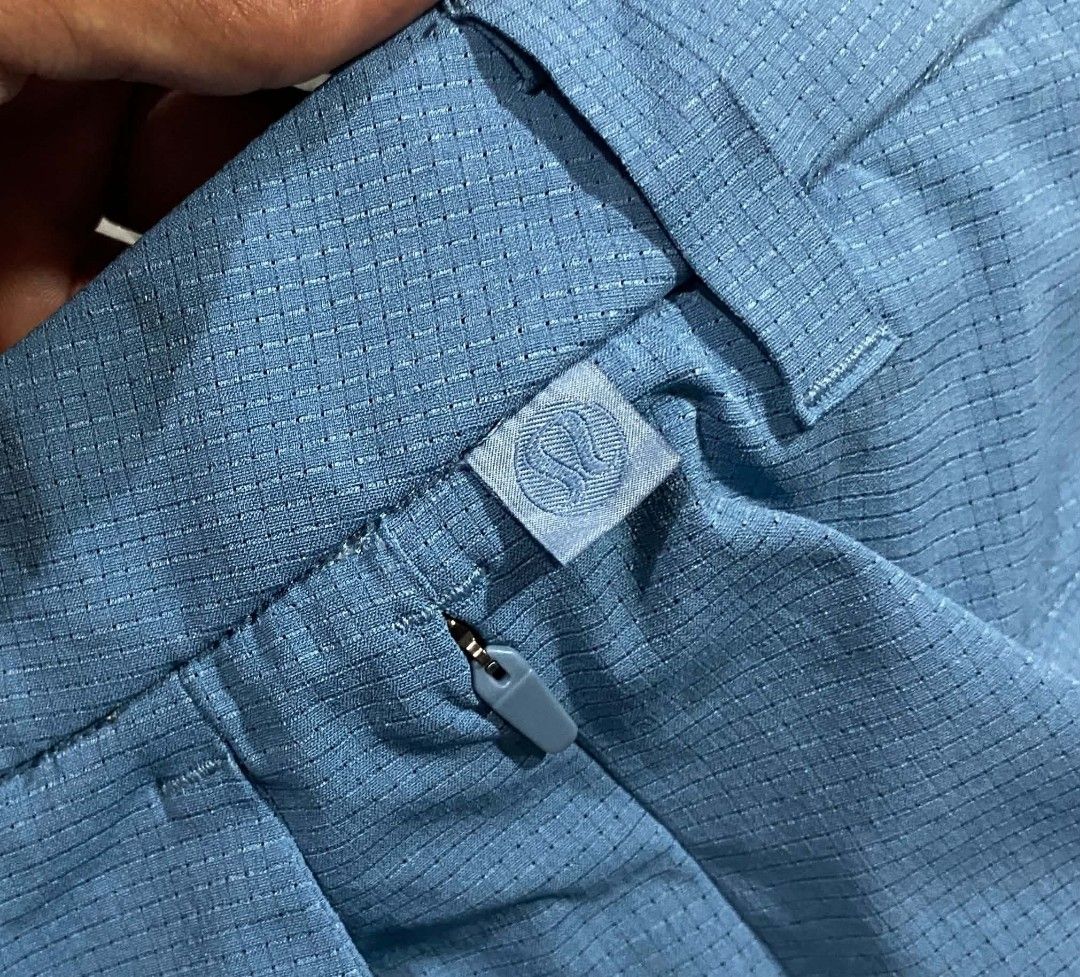 Lululemon ABC Shorts Textured Blue Size 34 (Category: Shorts) located in Sorsogon. Submitted by johnmichae69459 (Listing ID 1469811521, Image 2). Description: - Brand: Lululemon ABC Shorts - Color: Blue with stylish textured grid pattern - Size: 34 (verified on interior size dot) - 18 lenght - Storage: Standard pockets plus an extra secure zippered side pocket - Details: Button waist closure with belt loops - Condition: Impeccable, clean inside a